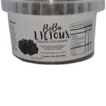 A clear plastic container of uncooked **Tapioca Pearls** labeled "Boba Licious" with a nutritional information panel on the side.