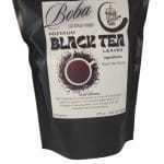 A black, sealed package of Boba Licious VDB Premium Black Tea Leaves, displaying instructions and ingredients, with a 250-gram weight indicator.